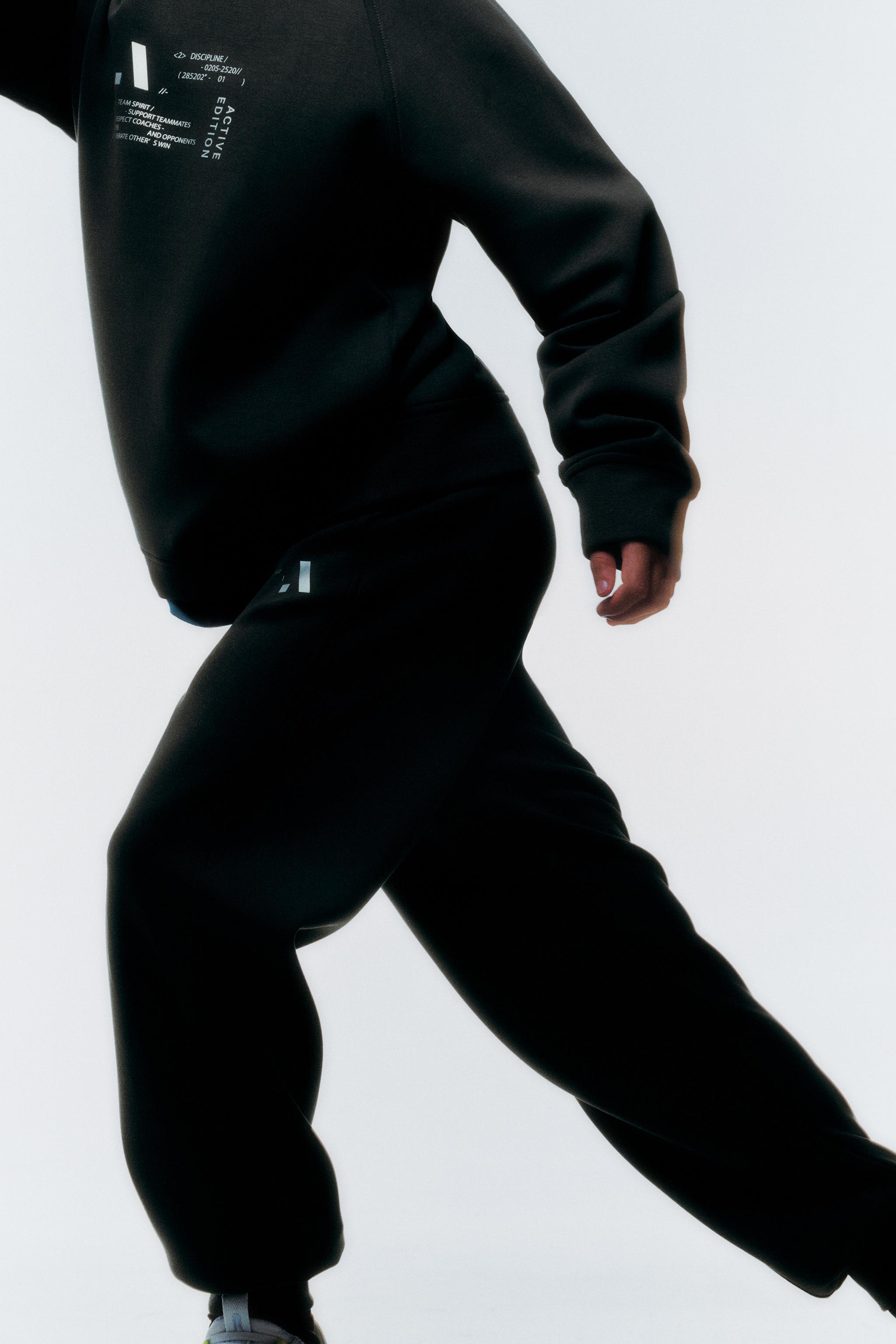 REFLECTIVE TEXT SPORTY JOGGER PANTS